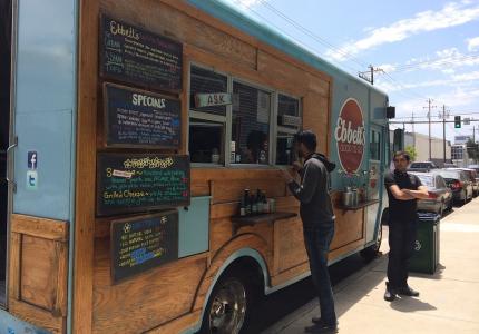 Taco truck serving customers